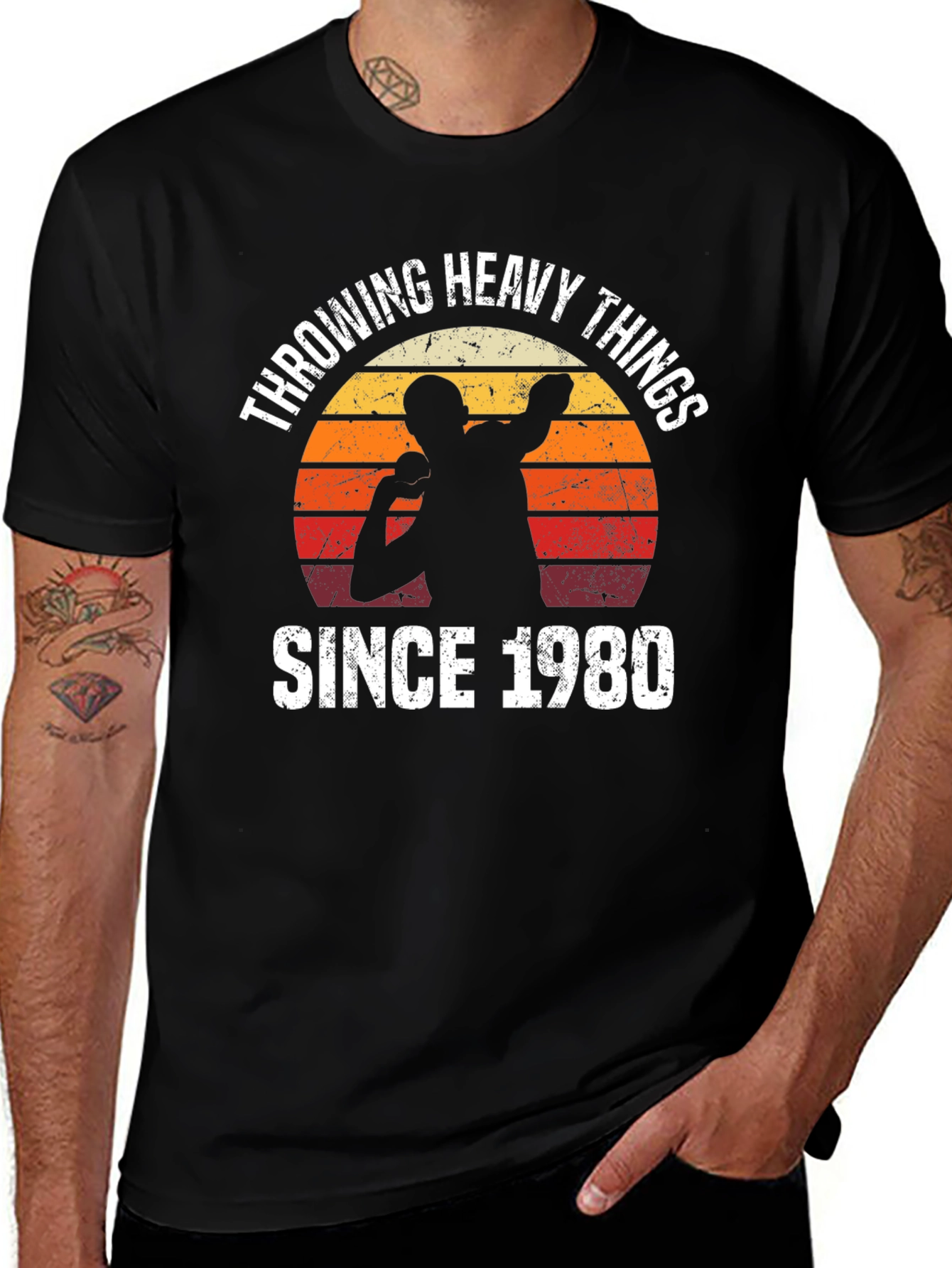 Throwing Heavy Things Since 1980 Graphic Tee