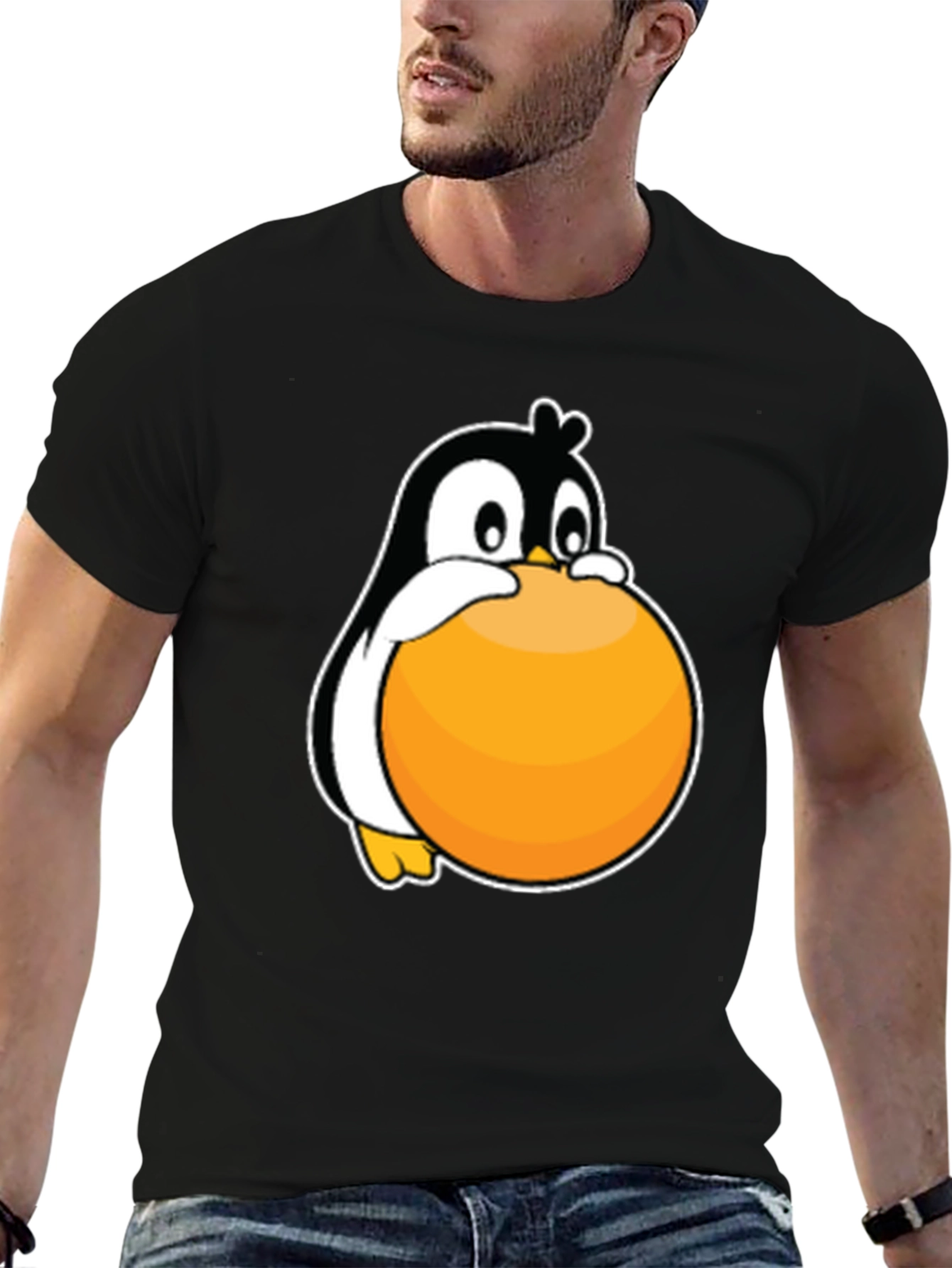 Penguin Hugging Ball Graphic Tee